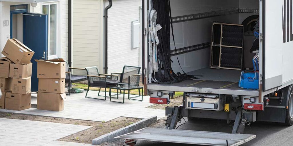 boxes outside of a house-okanaganpacking